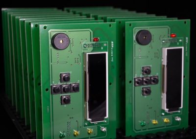 Several PCBA Assembled by a PCB Board Manufacturer Displayed in Front of a Black Background